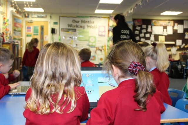 Jam Coding pupils during a computing lesson