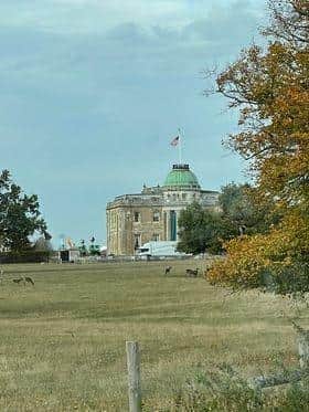 The American flag can be seen flying at Tyringham Hall during the filming