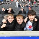 MK Dons fans have been praised by boss Paul Warne for staying with the team during a tough season.