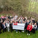 Childbase Partnership Charity Reps hand over the cheque to BHF