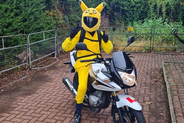 Kier wears all the correct protective gear under his Pikachu costume
