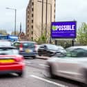 Digital posters are going up in cities across the UK, including in Milton Keynes, as part of a campaign to raise awareness of research into spinal cord injuries