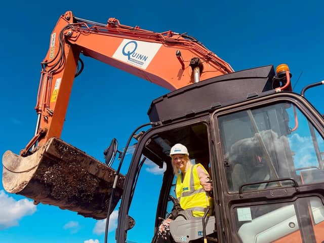 Cllr Zoe Nolan breaks the first piece of ground for the 5,000-home new MK East development just outside Newport Pagnell