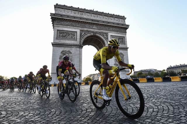 The winner of the 2019 Tour de France - Colombia's Egan Bernal - leads the pack down the Champs Elysees in Paris (Photo: ANNE-CHRISTINE POUJOULAT/AFP via Getty Images)