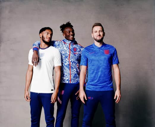 Joe Gomez, Tammy Abraham and Harry Kane model the new England kits (Nike)