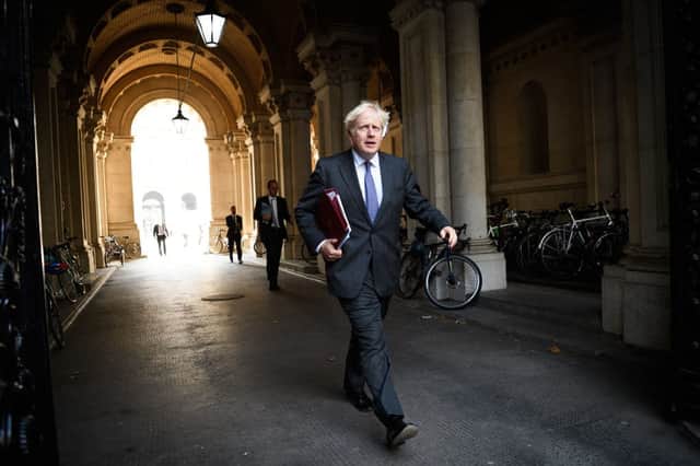 Boris Johnson returns to Downing Street following the weekly Cabinet meeting at the Foreign & Commonwealth Office on September 15, 2020 in London, England. (Photo by Leon Neal/Getty Images)