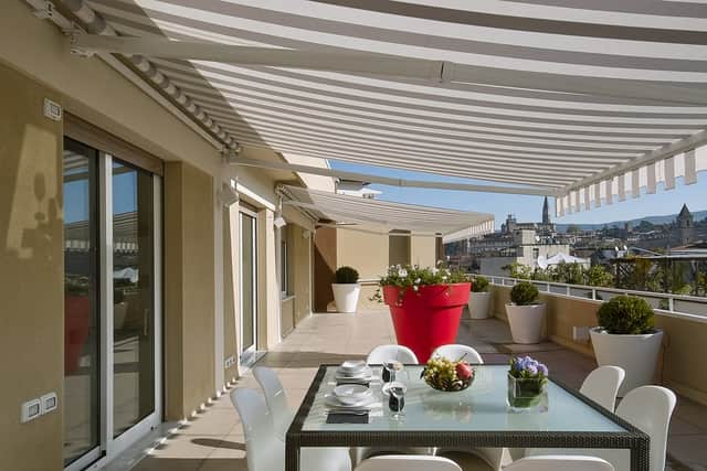 Awnings are a great addition to weatherproof gardens. (Picture: Shutterstock)