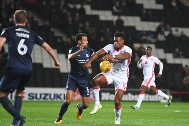 Chuks Aneke battles for the ball with Anton Ferdinand. Picture by Jane Russell