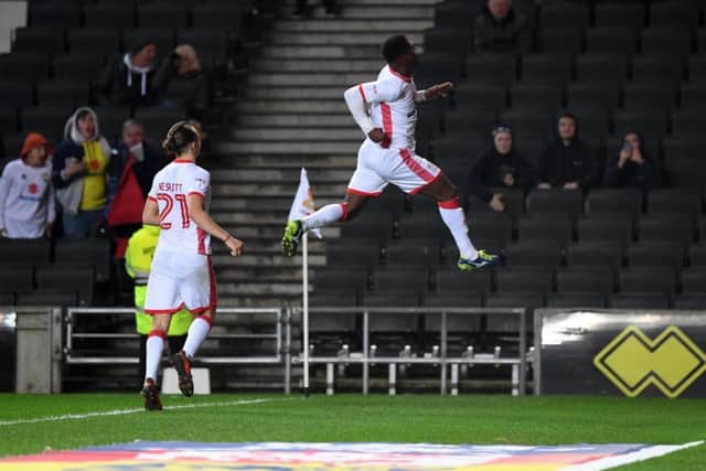 Kieran Agard celebrates his equaliser. Picture by Jane Russell
