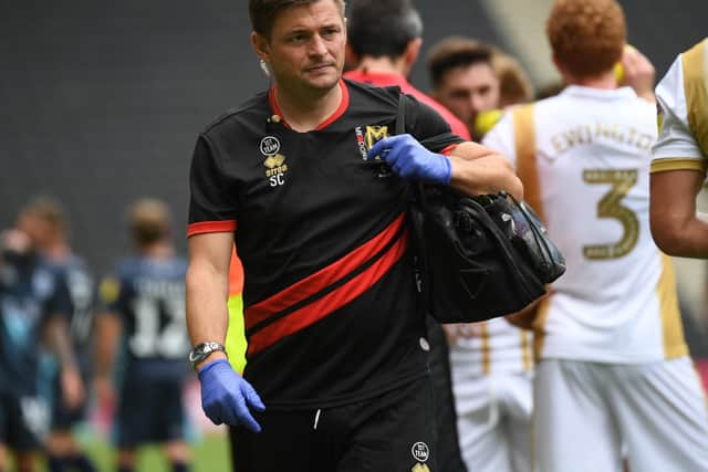 Dons physio Simon Crampton