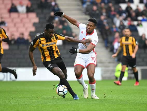 Chuks Aneke battles for the ball during MK Dons' FA Cup clash with Maidstone United (Pictures: Jane Russell)
