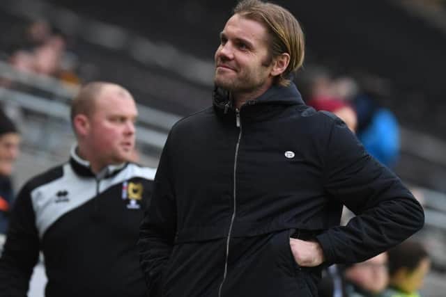 Robbie Neilson was all smiles as Dons beat Maidstone in the FA Cup
