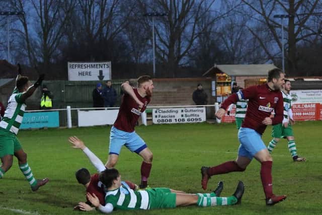 Tom Liversedge is fouled in the box, winning Newport Pagnell Town a penalty.
Pic: Sportshots.org.uk