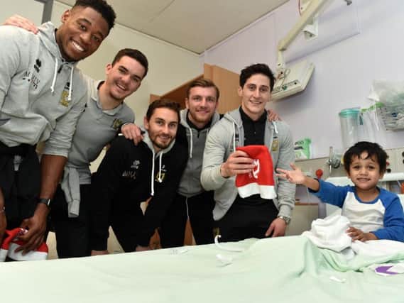 MK Dons players on the children's ward