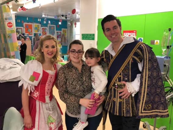Cinderella and Prince Charming visited patients in the children's wards