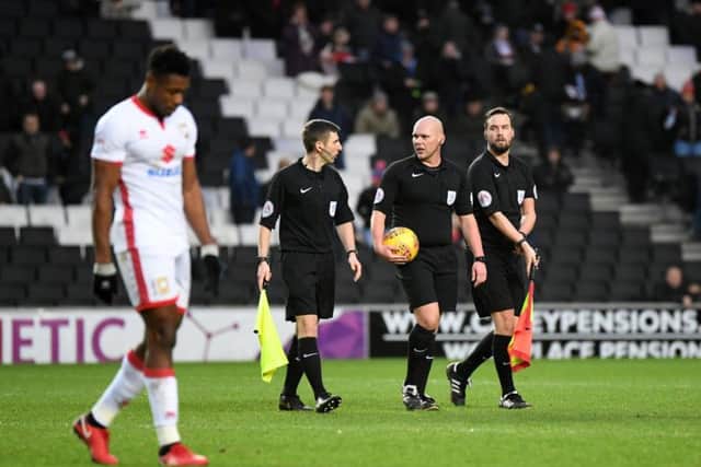 The referee came 'under scrutiny' from Robbie Neilson and his staff at half time