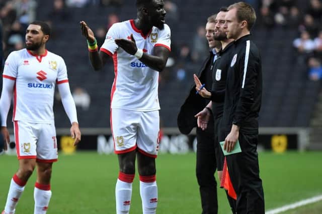 Cisse remonstrates with the fourth official