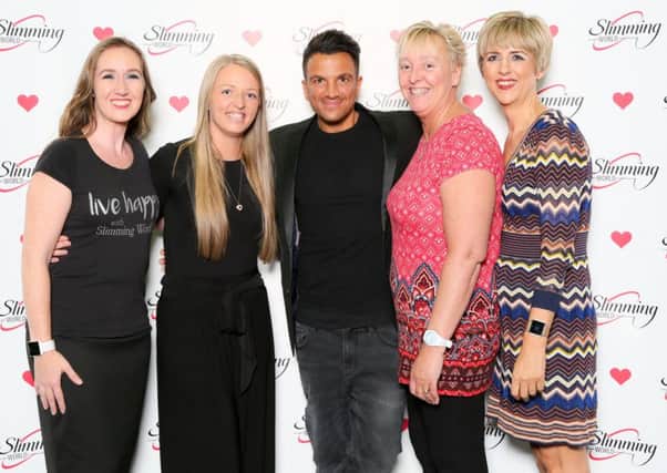 Peter Andre with slimming consultants from MK