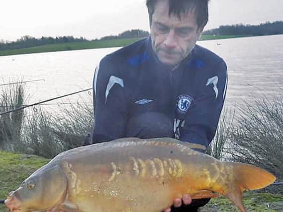 Andy Walford with his first Furzton carp of the year