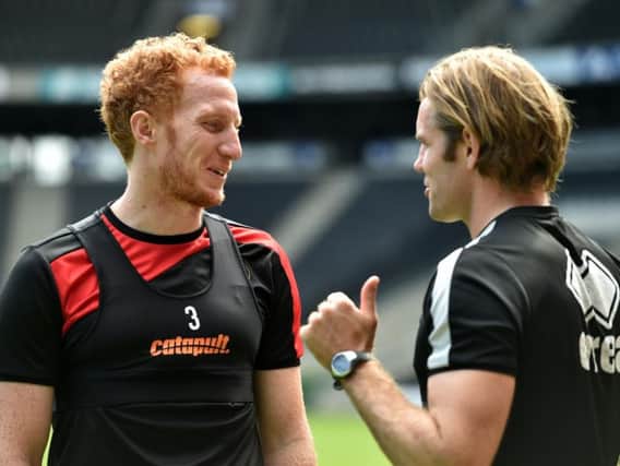 Dean Lewington and Robbie Neilson