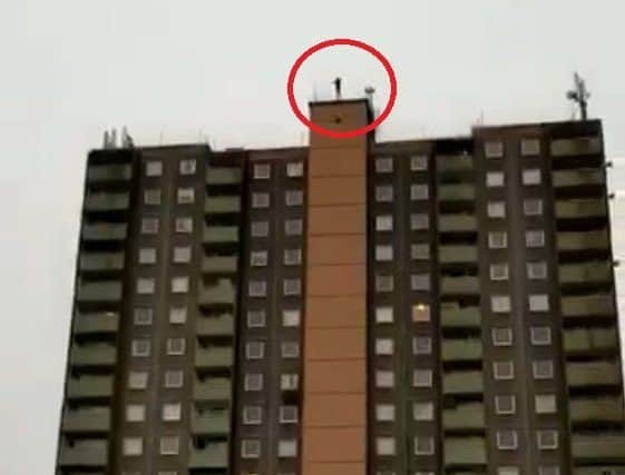 A man was filmed parachuting off the Mellish Building in MK