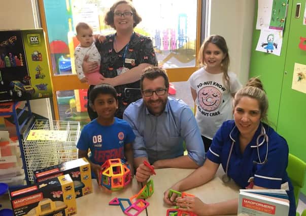 Toys are donated to MK Hospital children' s ward