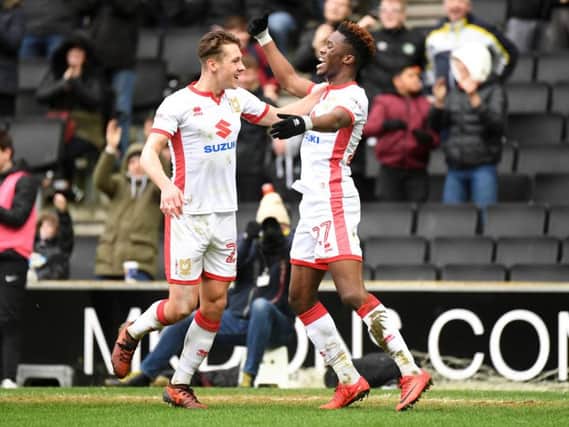 Ike Ugbo celebrates his first goal for MK Dons