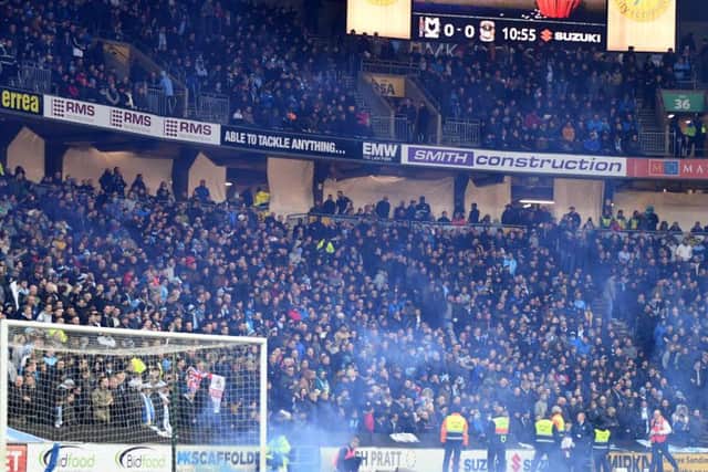 Coventry fans smuggled their smoke grenades into the away end