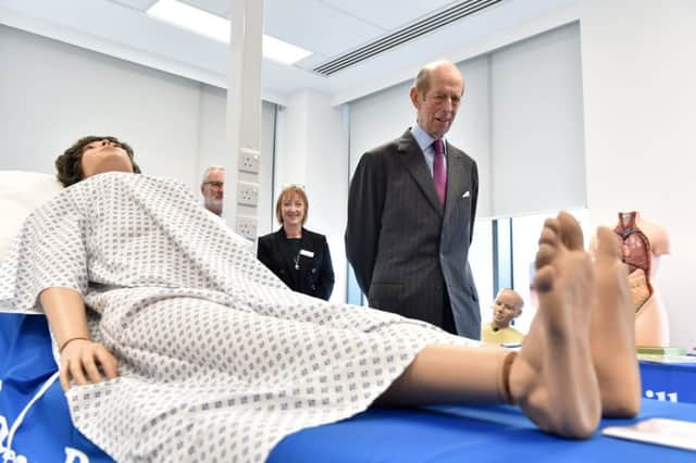 The Duke examines one of the medical mannequins students will use at the new academic centre