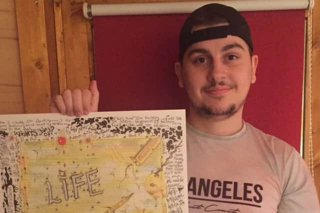 JJ with the collaborative artwork