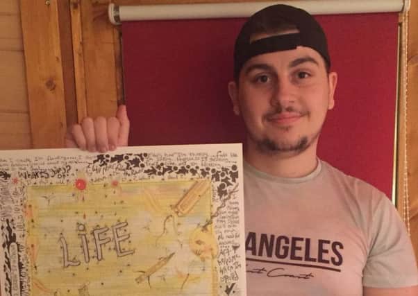 JJ with the collaborative artwork