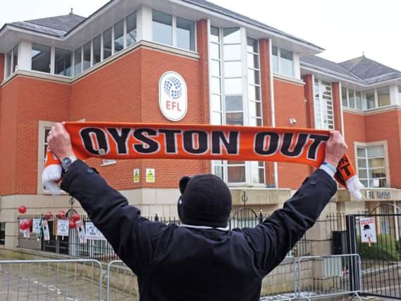 Blackpool fans protest Oyston's ownership of the club