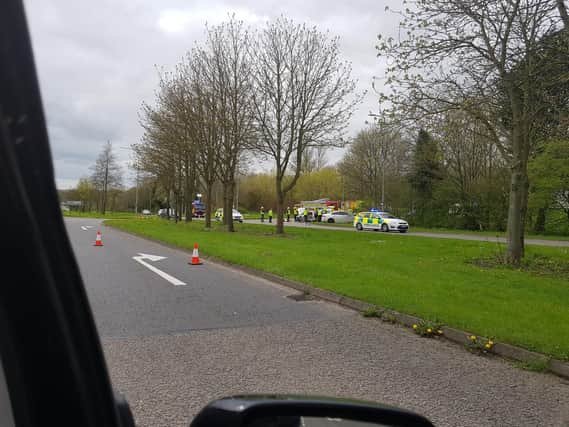 Emergency services at the scene of the accident yesterday