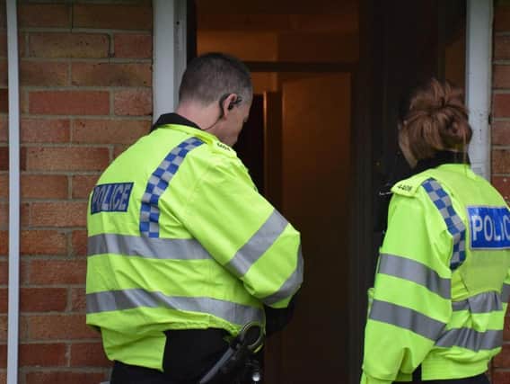 Officers carrying out warrants this morning