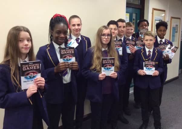 St Paul's Catholic School pupils with their Poetry Games books