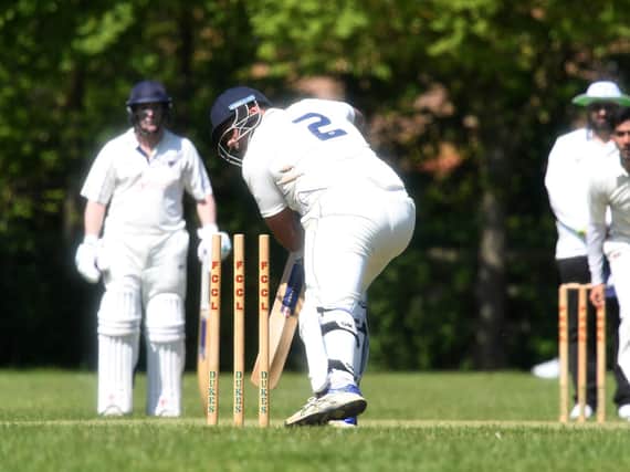 MK's Nimesh Chavda is bowled out