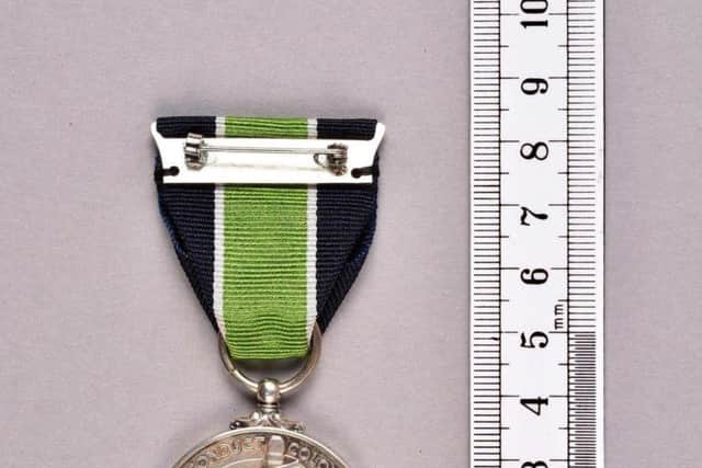 Hang Yin Leung's long service police medal