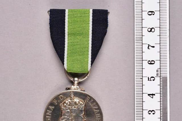Hang Yin Leung's long service police medal