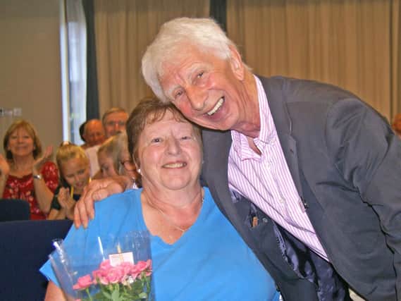 Jackie Starkey, organizer of the Disabled Swmathon Club and Bill Blyth, a Swimathon Committee member