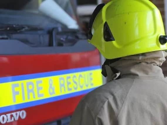 Fire severely damagedtwo single-storey semi-detached houses this morning
