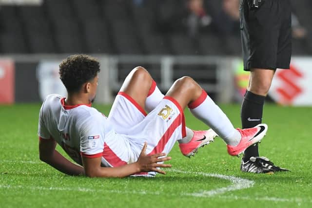 This was a familiar sight for MK Dons fans last season as Osman Sow suffered regular injuries