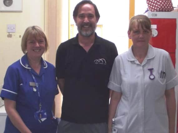 Cathy (left) and Eddie (right) from MK General Outpatients Dept, with Steve McNay (Council Manager  WCC- centre)