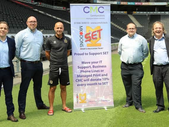 Announcing the new partnership with MK Dons chairman Pete Winkelman, right