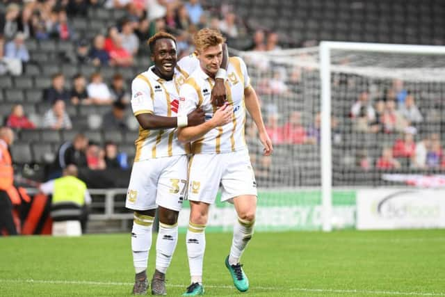 Dylan Asonganyi and Ryan Watson celebrate