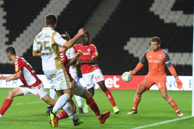 Callum Brittain teed up Dylan Asonganyi for Dons' third goal against Charlton