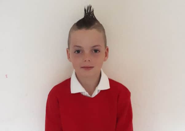 Eight-year-old Tadhg came home sobbing because hed been told to flatten his new mohawk haircut