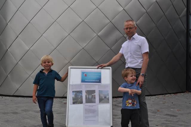 Tower Commercial Director Paul Lindsay outside the new galleries with some of the Museums biggest fans  his sons