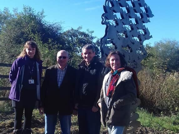 Sarah Myers with Julie Dawes (left) and Councillors Gray and Sargent at the sculpture