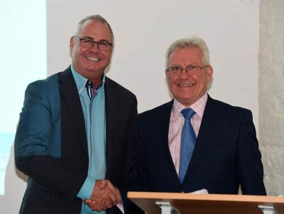 New president Paul Muscelle (left) with immediate past president Andrew Hall