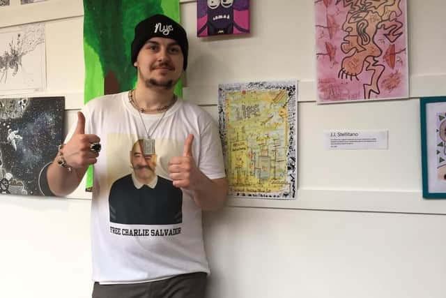 JJ Stellitano with some of the work he has collaborated on with Charlie
